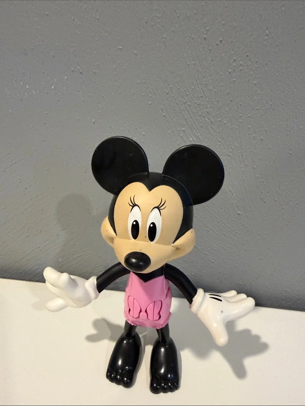 Minnie Mouse with push button arms and head figurine